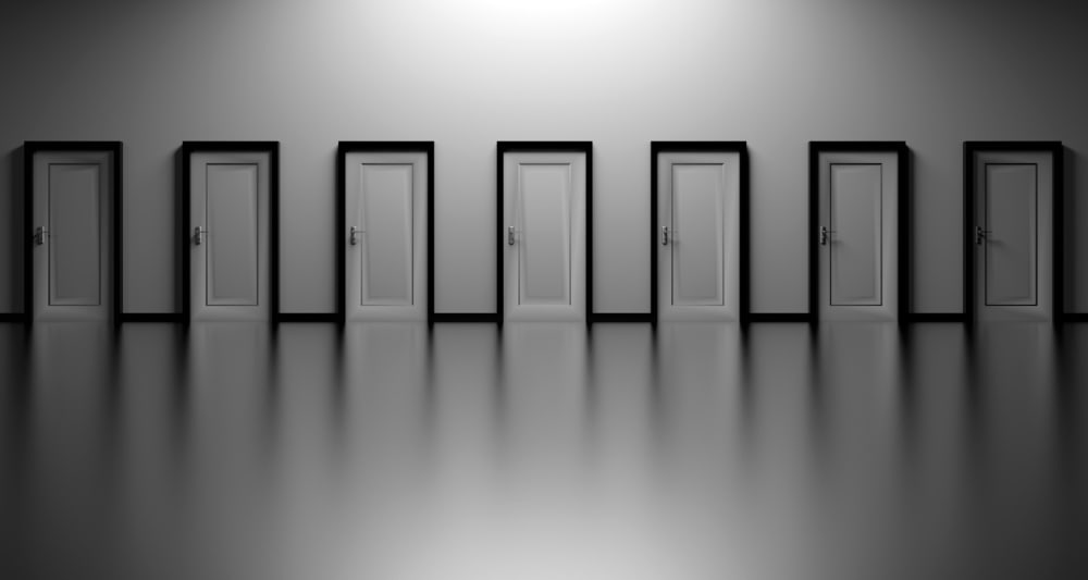 Many unopened doors to symbolise decision-making
