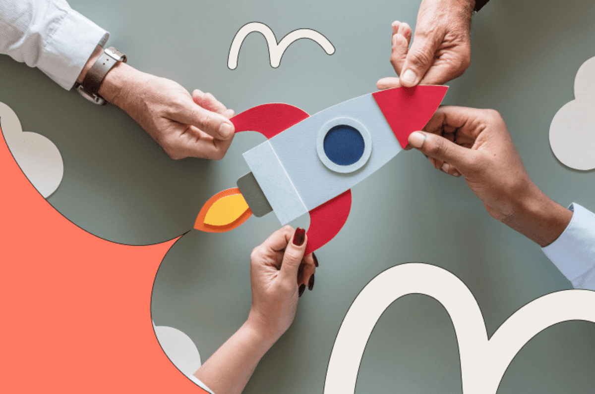 Four hands holding a cartoon rocket ship that's taking off