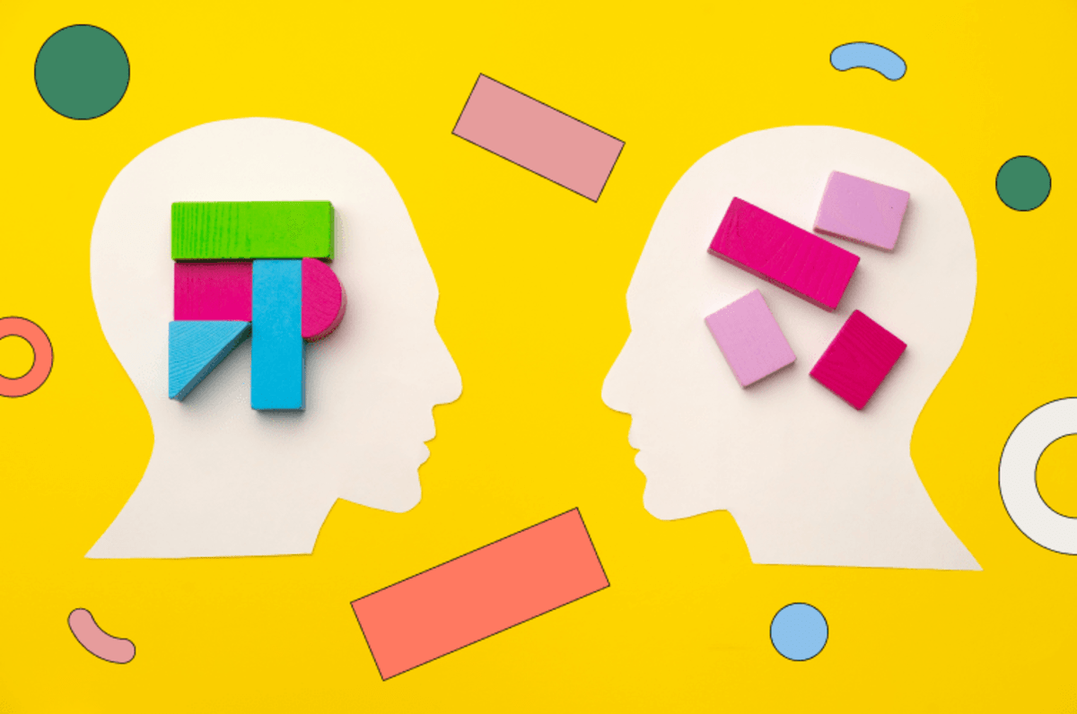 Animated outline of two people's heads, showing different building blocks in their brains, representing neurodiversity