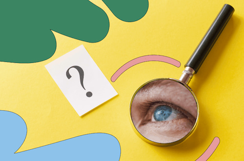 Eye looking into a magnifying glass, next to a question mark on a white piece of paper