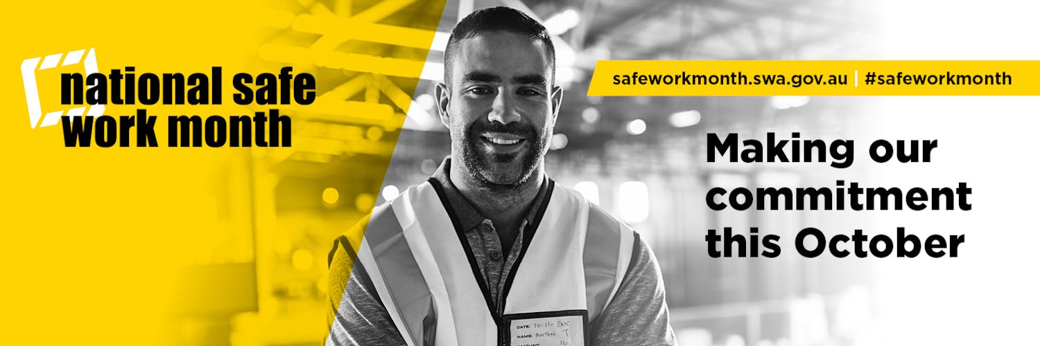 Man standing smiling, surrounded by the National Safe Work Month logo