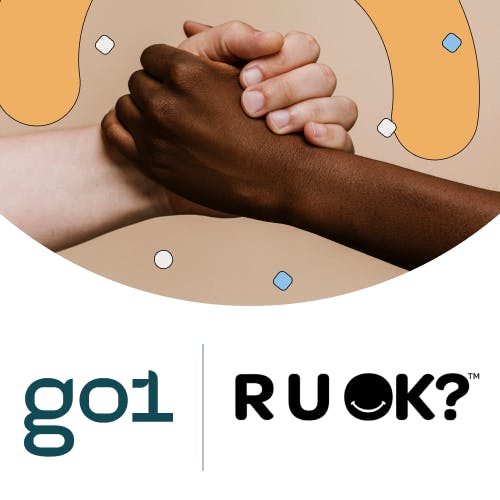 Two hands clasped above Go1 and R U OK? logos