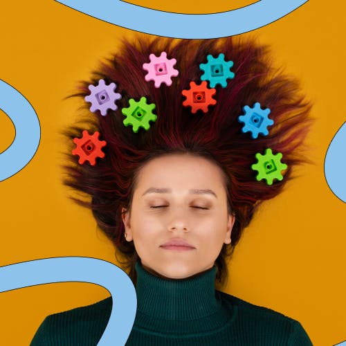 Woman lying down the flowers growing out of her hair, representing cognitive skills