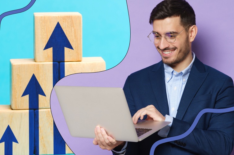 Man typing on his laptop next to arrows pointing upwards, representing future-proofing the workforce